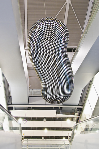 Illustration for article titled Digital Sculpture at Heathrow Airport Demonstrates that Every Cloud Has a Silver Lining